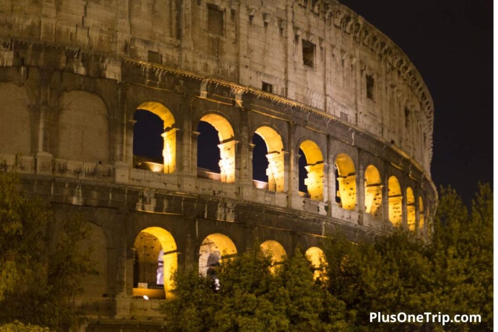 The illuminated Colosseum at night, the highlight of Rome sightseeing for groups