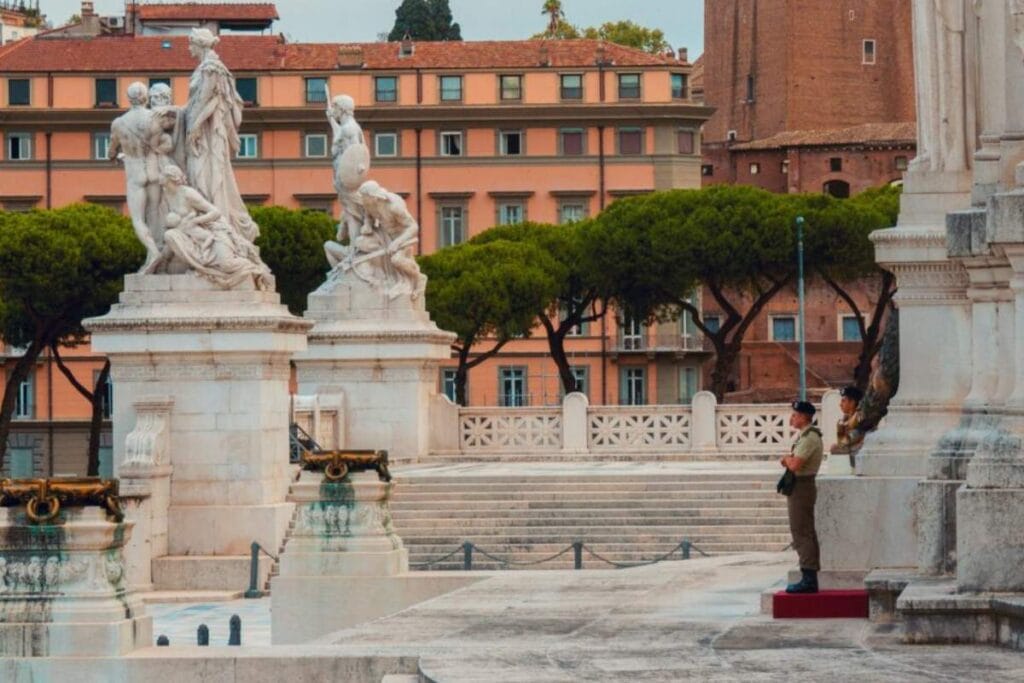 Sunny Roman piazza with statues and historic architecture