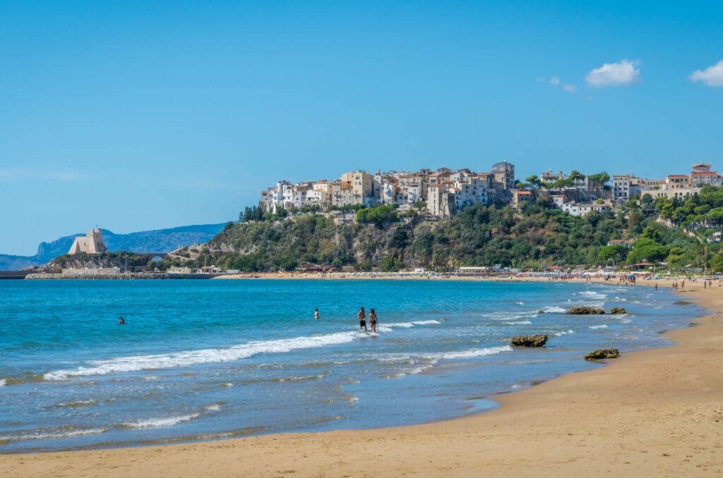 Beautiful sandy beach and coastal town, perfect for a relaxing family day trip from Rome